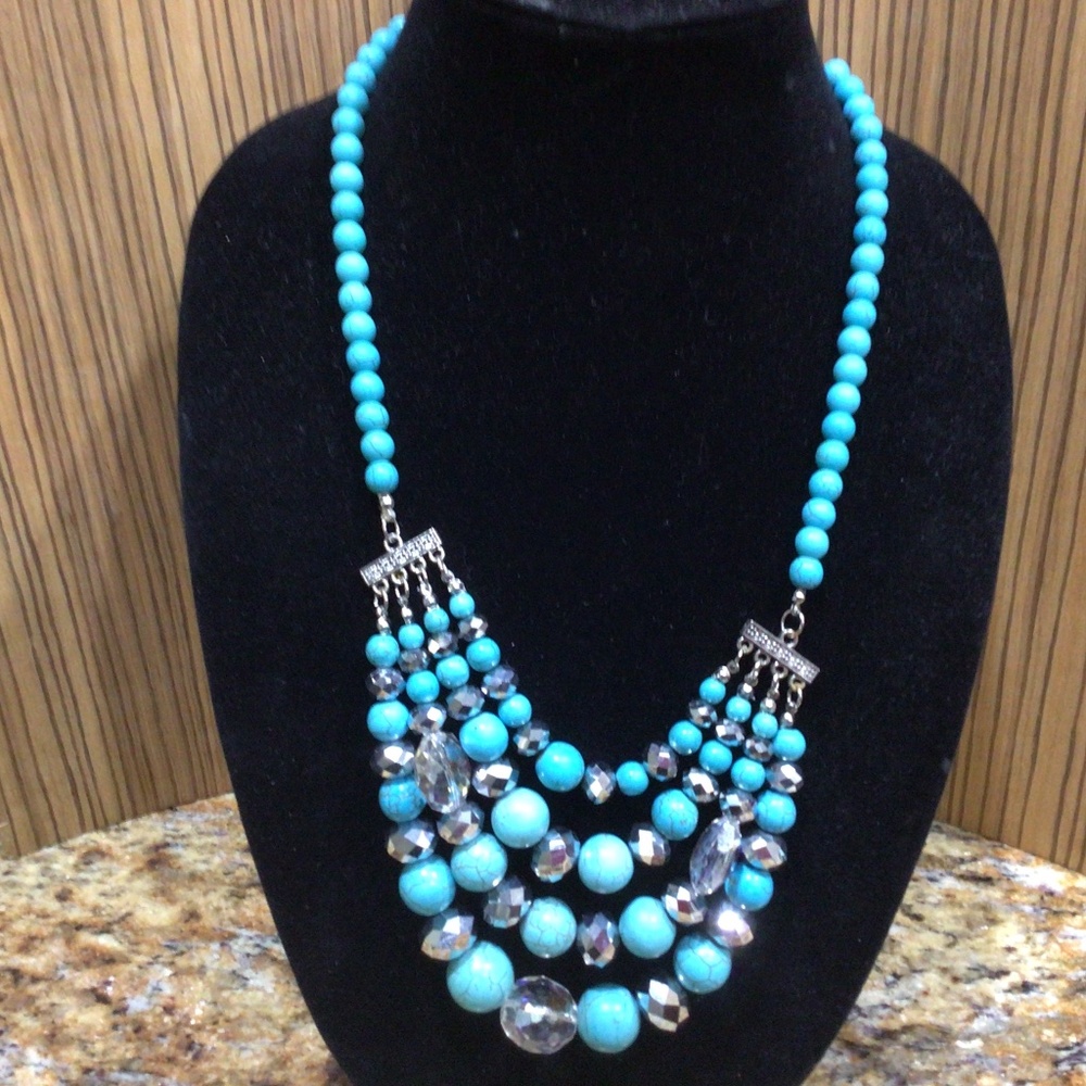 Fashion, Four tier  necklace with turquoise, clear and mirror like beads.